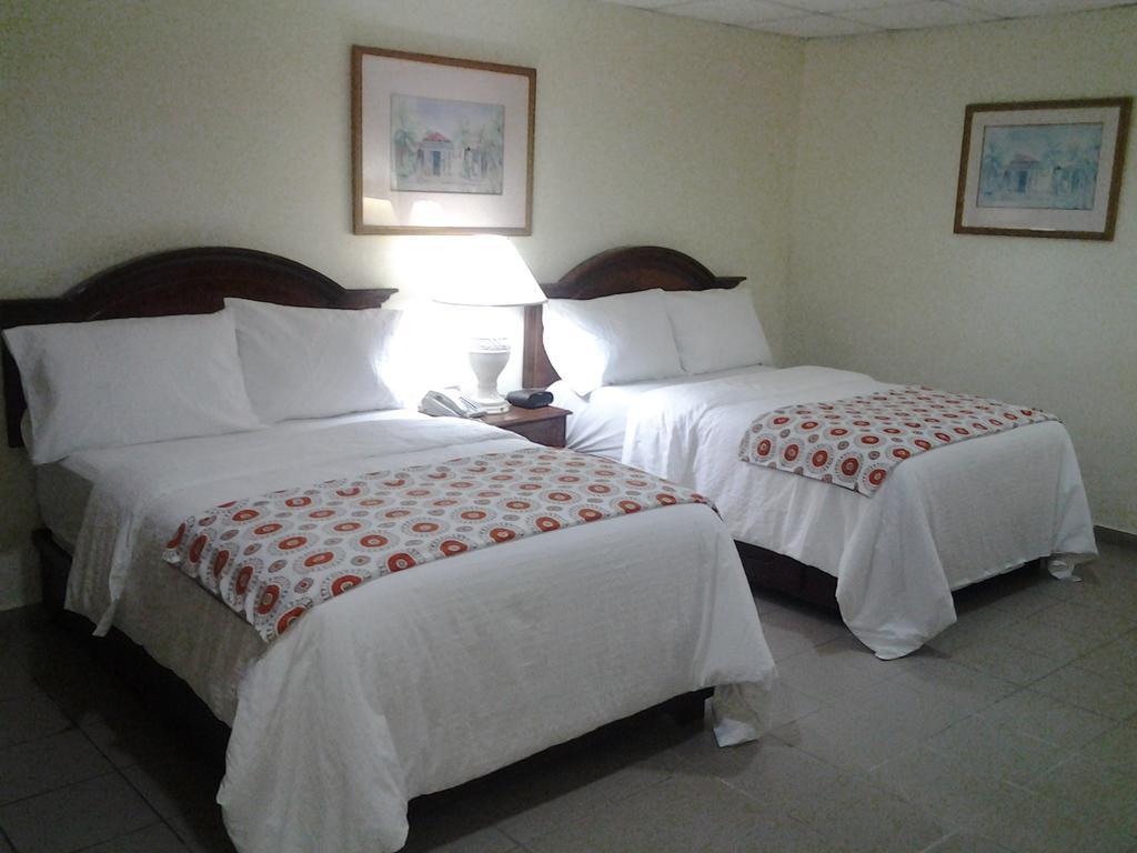 Micro Hotel Condo Suites Santo Domingo Quarto foto
